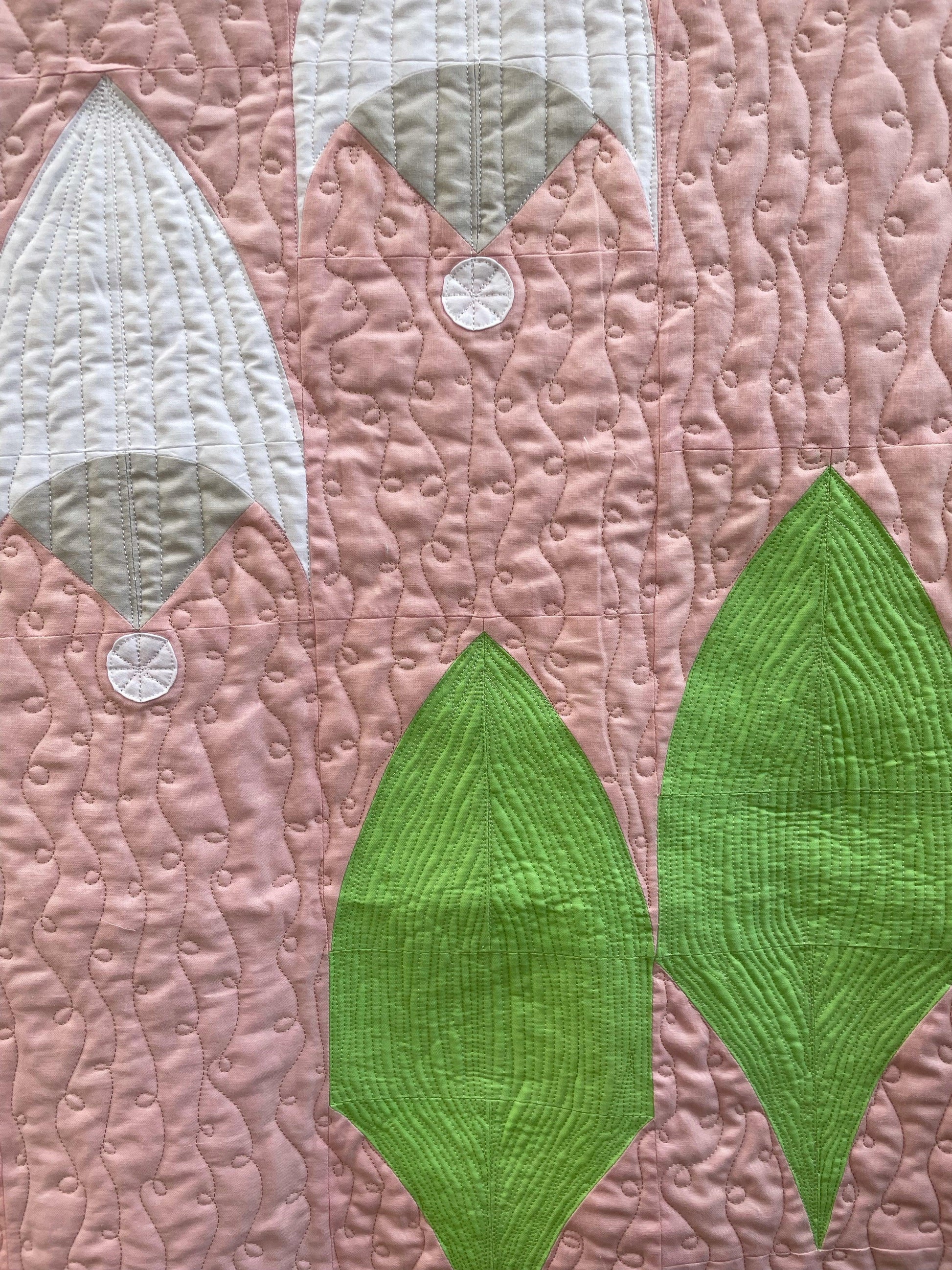 Close up on quilting.