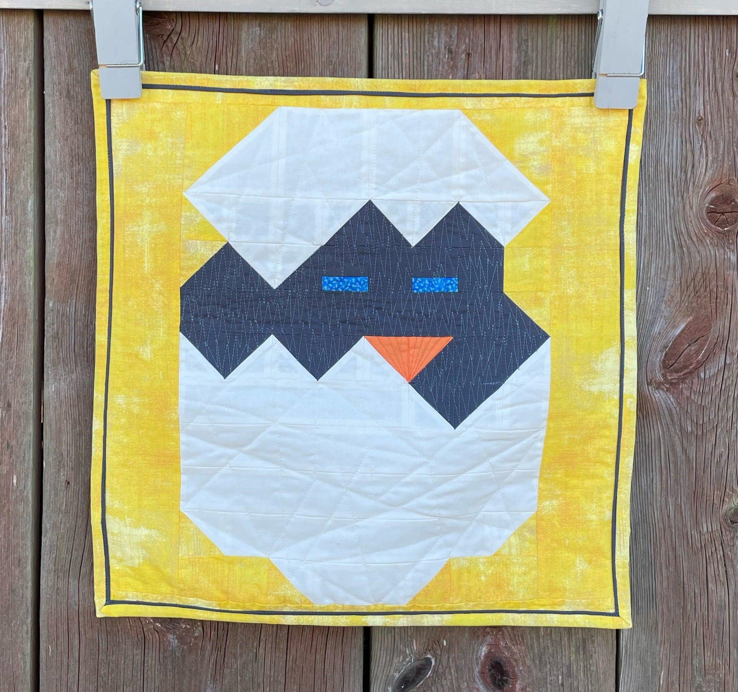 Pillow case against an old barn