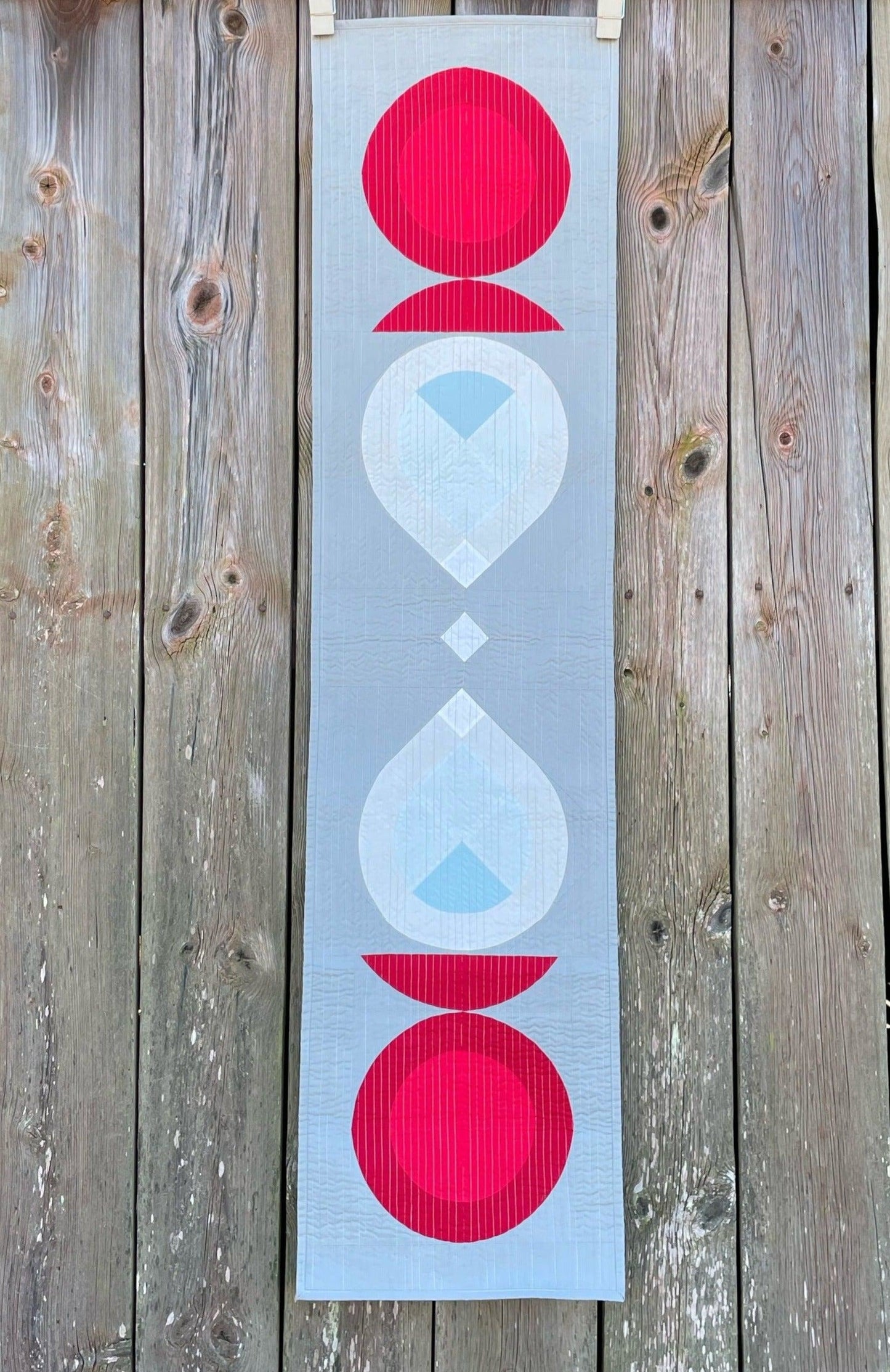 Traditional candle holder with light shining. Table runner.