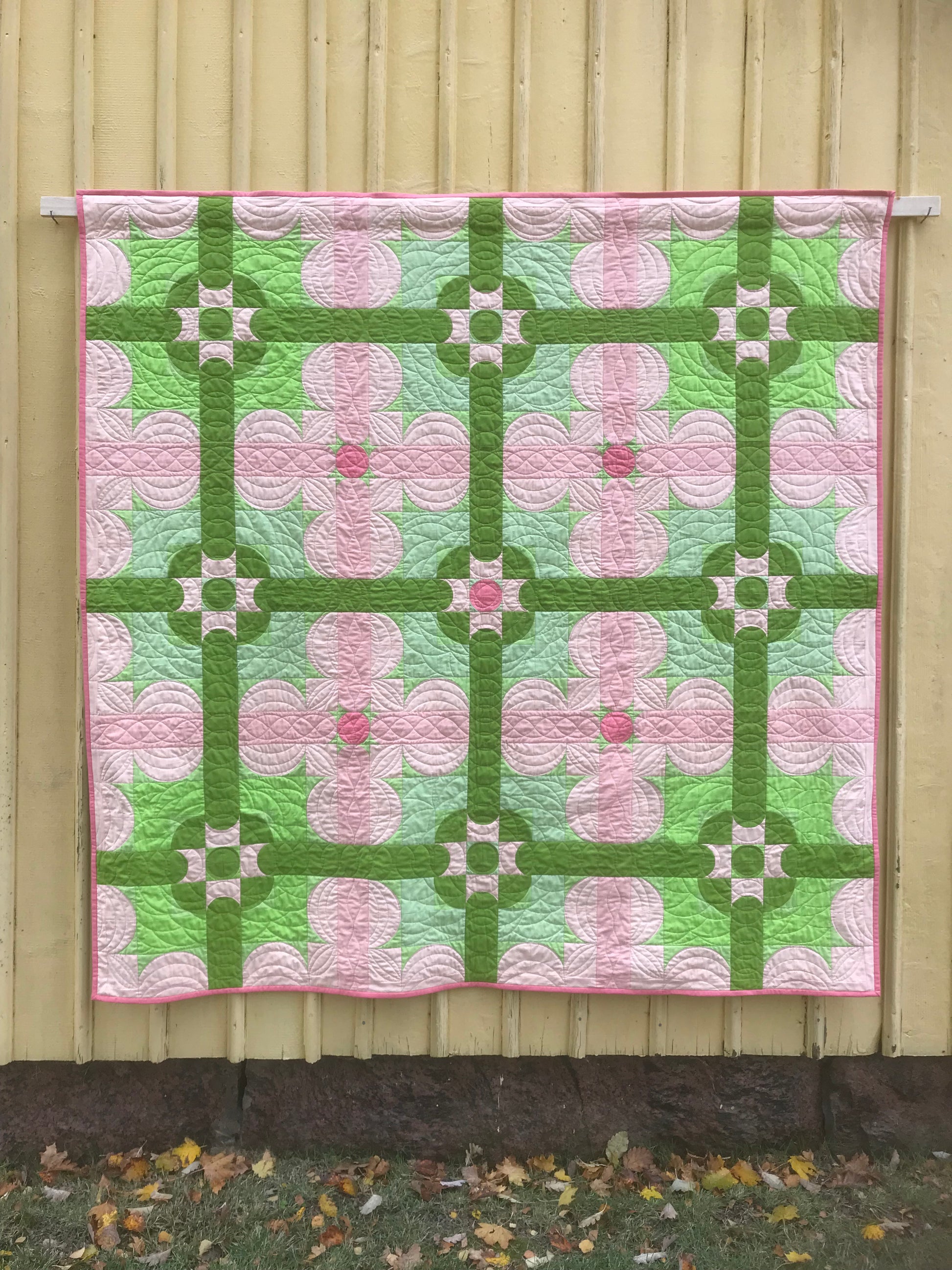 Quiltt against wall showing quilting. 